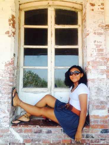 Sitting by the one of the ledges by the lighthouse. 